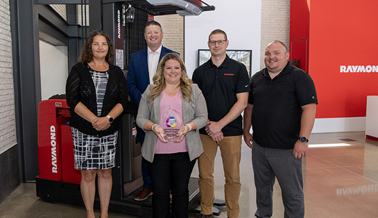 The Raymond Corporation team celebrates the SupplyTech Breakthrough Award win for iW.ObjectSense with a group photo