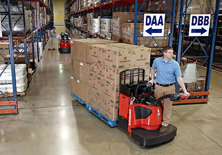 Raymond 8410 Pallet Truck in Warehouse